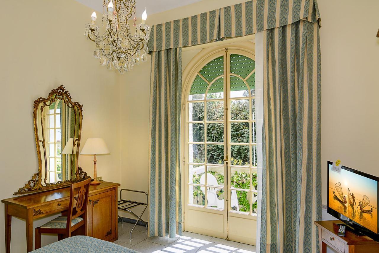 Hotel Poseidon Марина-ди-Пьетрасанта Экстерьер фото