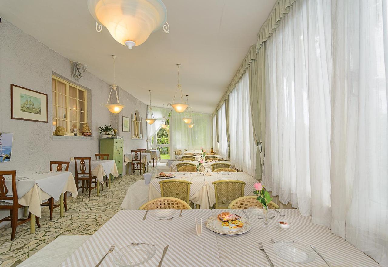 Hotel Poseidon Марина-ди-Пьетрасанта Экстерьер фото
